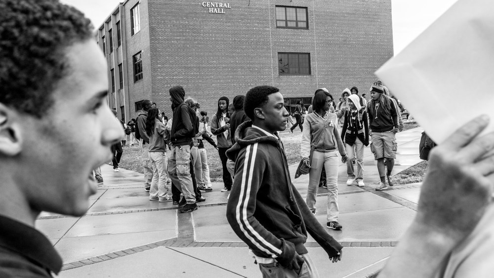A group of students outside of Normandy High School just moments after the bell rang at the end of school in Wellston, St. Louis County, Mo.