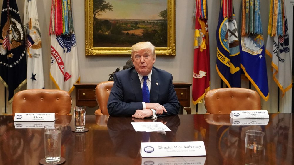 U.S. President Donald J. Trump speaks to the media during a meeting with congressional leadership in the Roosevelt Room at the White House, in Washington, D.C., November 28, 2017.