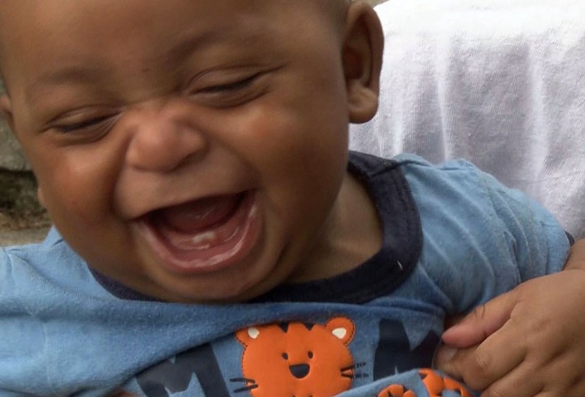 Seven-month old Martin DeShawn McCullough being held by his mom Jaleesa Martin. A judge in eastern Tennessee changed the boy's first name to Martin from "Messiah'. (Photo by Heidi Wigdahl/AP)