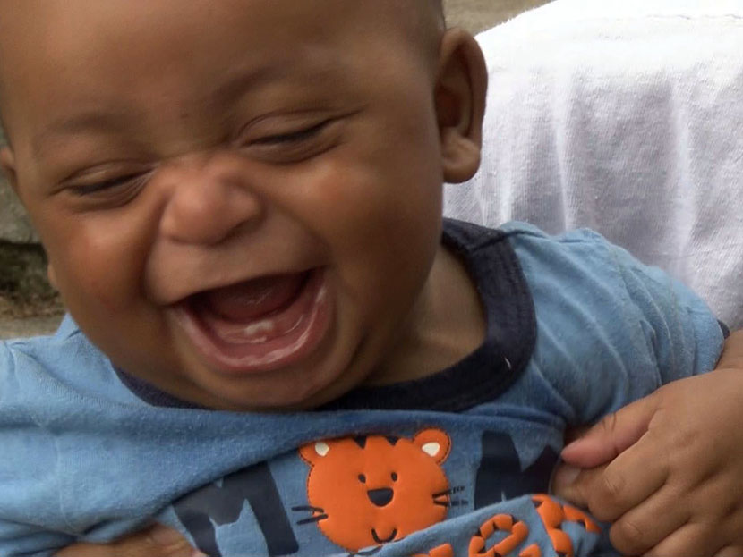Seven-month old Martin DeShawn McCullough being held by his mom Jaleesa Martin. A judge in eastern Tennessee changed the boy's first name to Martin from "Messiah'. (Photo by Heidi Wigdahl/AP)