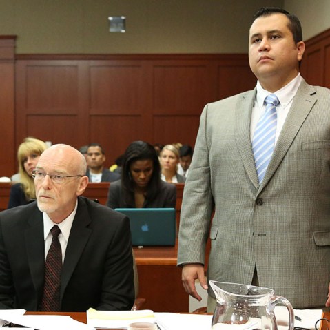 George Zimmerman stands for instructions from Judge Debra Nelson with attorney Don West, during his trial in Seminole circuit court in Sanford, Fla. Thursday, July 11, 2013. (Photo by Gary W. Green/Orlando Sentinel/Pool/AP)