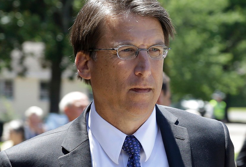 North Carolina Gov. Pat McCrory arrives for a memorial service for former North Carolina Gov. James Holshouser at Brownson Memorial Presbyterian Church in Southern Pines, N.C., Friday, June 21, 2013.  (Photo Gerry BroomePool/AP)