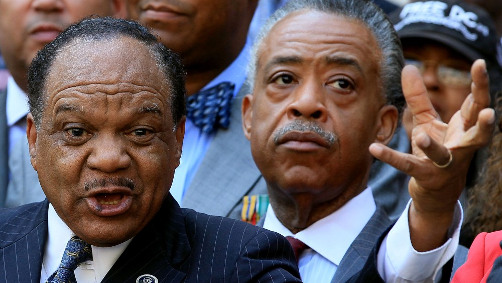 The Rev. Walter Fauntroy (L) gestures as he speaks, while the Rev. Al Sharpton (R), listens during a news conference in front of the John A. Wilson Building on Aug. 27, 2010 in Washington, DC. (Photo by Mark Wilson/Getty)