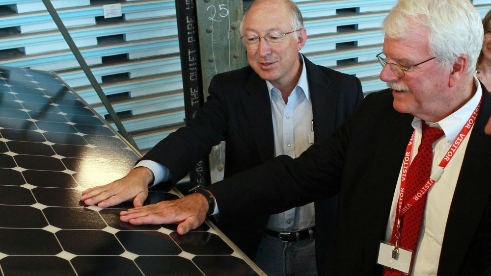 File Photo:  U.S. Secretary of the Interior Ken Salazar (L) and U.S. Rep. George Miller (D-CA) touch a solar panel as they tour Sunpower Corporation's research and development facility October 14, 2010 in Richmond, California. Salazar signed a Record...