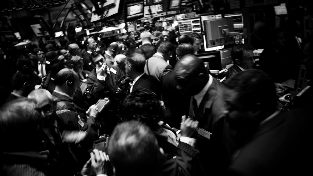 Traders work on the floor of the New York Stock Exchange.