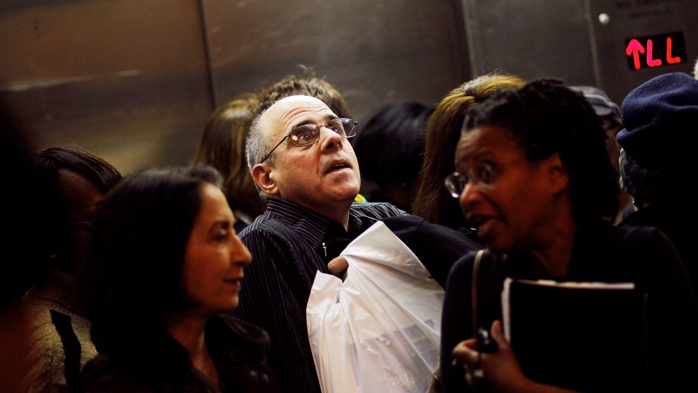 Older job-seekers crowd into an elevator on the way to a employment seminar at a "Work Search" event aimed at older unemployed people in New York City.