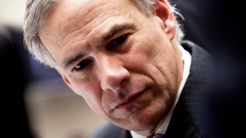 Texas Attorney General Greg Abbott speaks to reporters during a break in a hearing, Feb. 9, 2011, on Capitol Hill in Washington, DC.