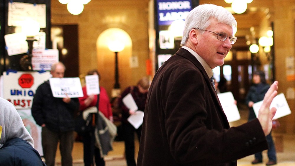Republican Wisconsin State Senator Glenn Grothman waves as he walks through the Wisconsin State Capitol on March 4, 2011 in Madison,Wisconsin.