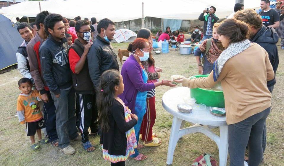 A group of volunteers with Chabad-Lubavitch of Nepal distribute hot food to hundreds of hungry Nepalese citizens on Wednesday, April 29 in Kathmandu, Nepal. (Photo by Chabad.org/Chabad of Nepal)