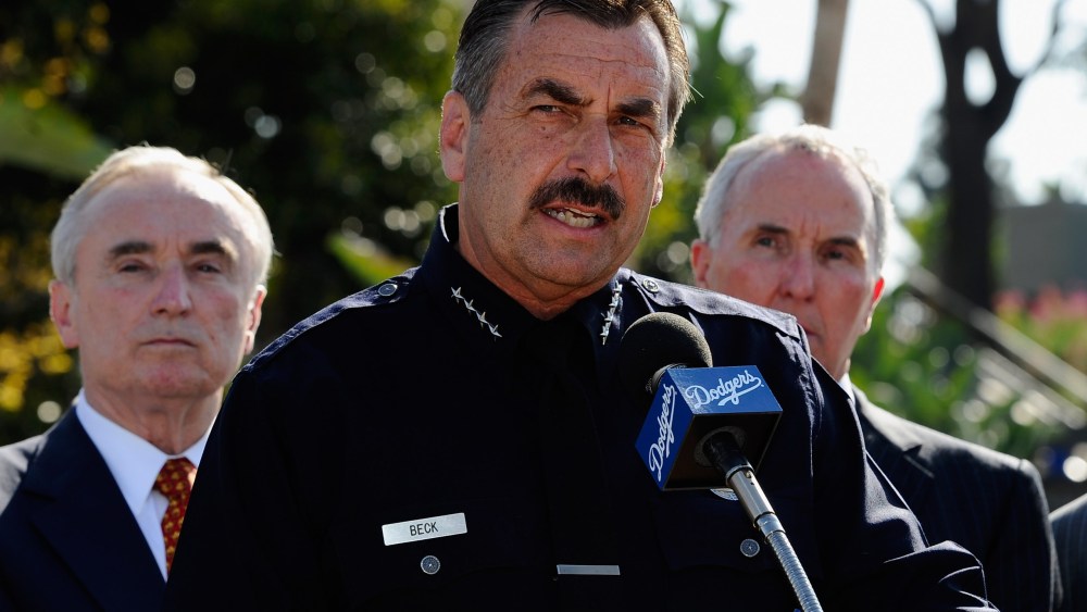 File Photo: Los Angeles Police Department Chief Charlie Beck (C) speaks during a news conference at Los Angeles Dodger Stadium on April 14, 2011 in Los Angeles, California. (Photo by Kevork Djansezian/Getty Images/File)