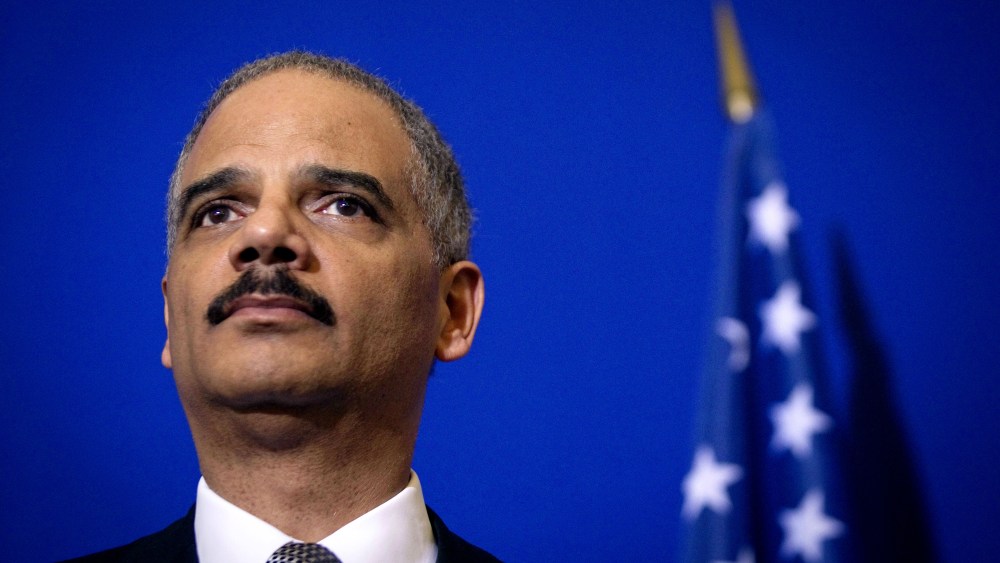 US General Attorney Eric Holder listens during a press conference following a meeting on May 9, 2011 at the Interior ministry Place Beauvau in Paris.