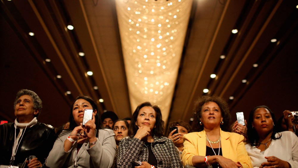 Supporters listen to U.S. President Barack Obama as he addresses the Women's Leadership Forum at the Grand Hyatt Hotel May 19, 2011 in Washington, DC.