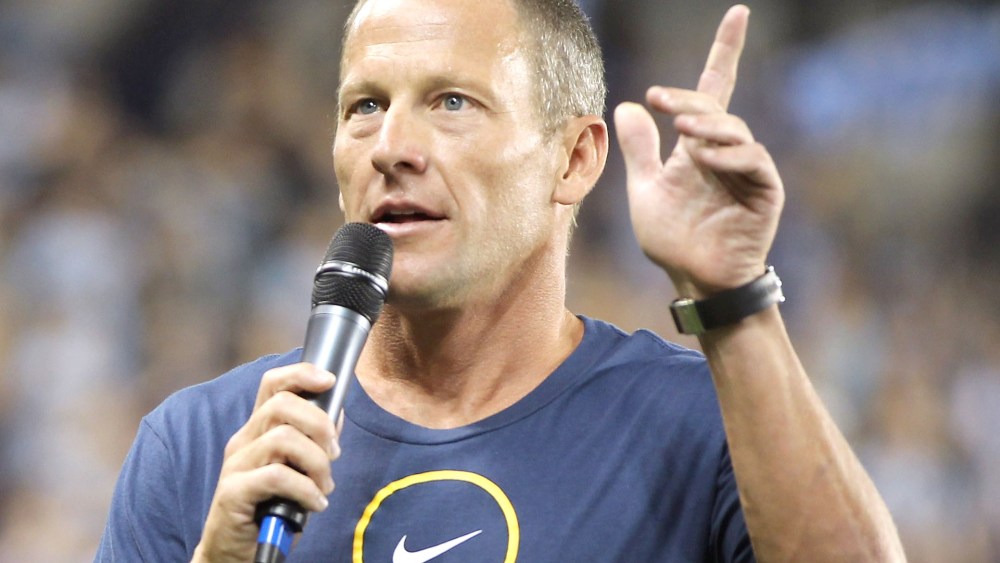File Photo: Lance Armstrong speaks to the crowd prior to the innaugural game between the Chicago Fire and Sporting Kansas City at LiveStrong Sporting Park on June 9, 2011 in Kansas City, Kansas.  (Photo by Jamie Squire/Getty Images/File)