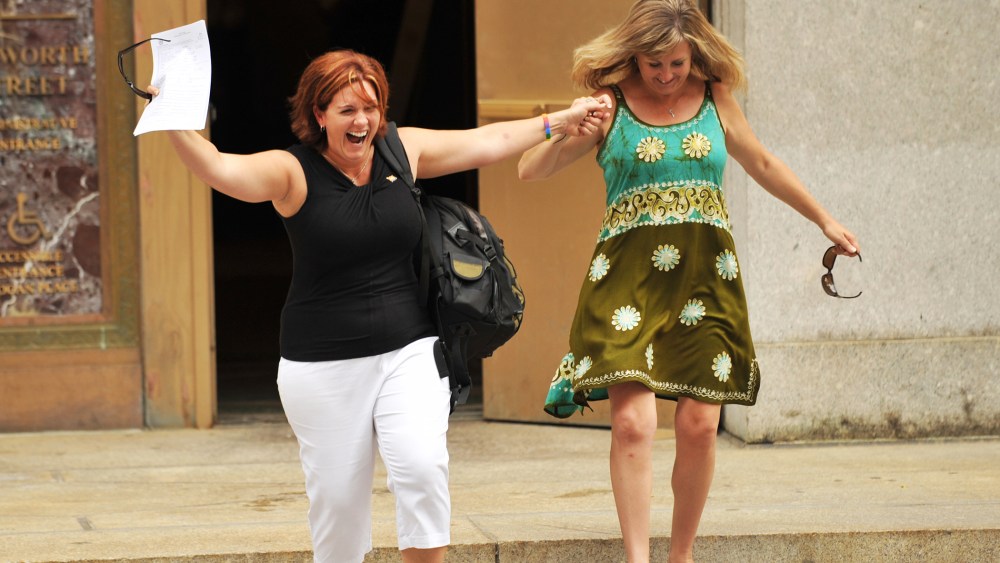 Wendy Torrington (L) and Kimberly Moreno (R) of Long Beach, Mississippi, celebrate being the first same-sex couple to obtain a marriage license at Manhattan's City Clerk's Office July 24, 2011 in New York.