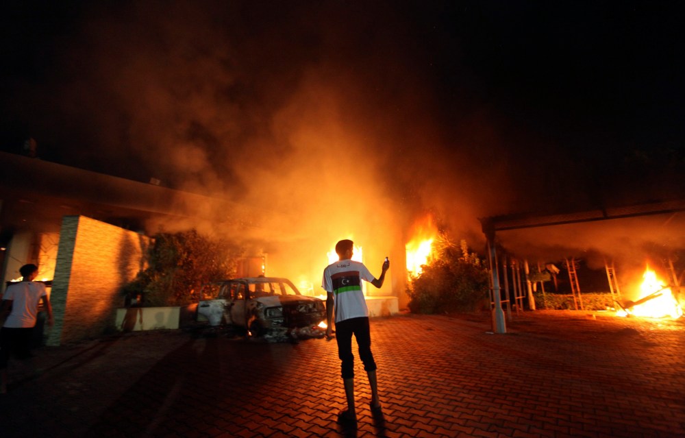The U.S. Consulate in Benghazi is seen in flames during a protest by an armed group said to have been protesting a film being produced in the United States September 11, 2012.
