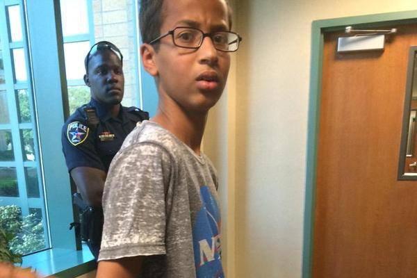 Ahmed Mohamed, A 14-year-old North Texas student, appears in handcuffs, after his arrest on charges of making a "hoax bomb."
