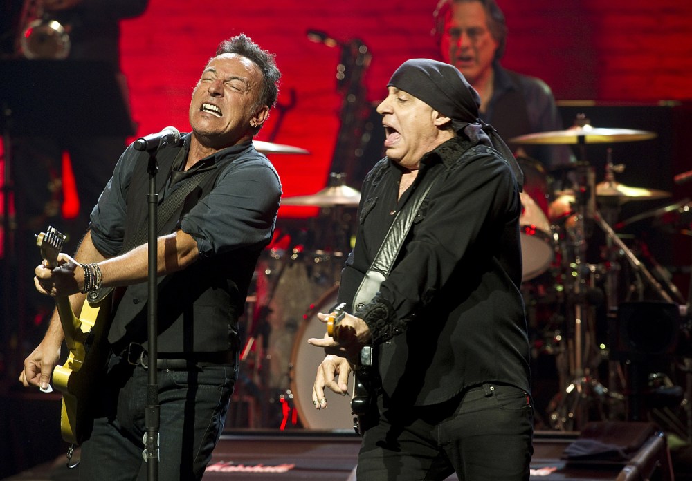 Bruce Springsteen (L) and Steven Van Zandt perform at The Apollo Theater on March 9, 2012