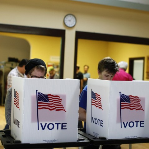 Voters cast their ballots in a recall election for the governor and lieutenant governor at the Wil-Mar Neighborhood Center June 5, 2012 in Madison, Wisconsin.