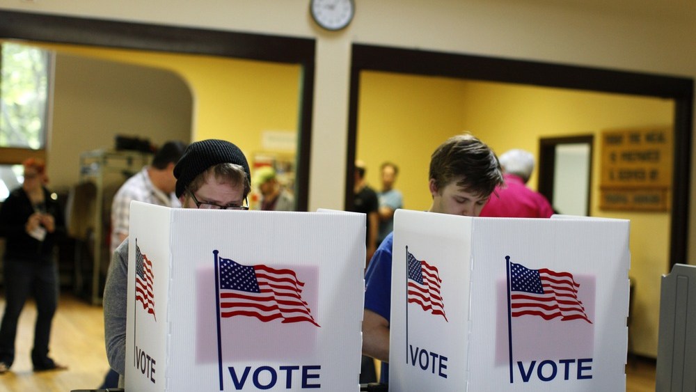 Voters cast their ballots in a recall election for the governor and lieutenant governor at the Wil-Mar Neighborhood Center June 5, 2012 in Madison, Wisconsin.