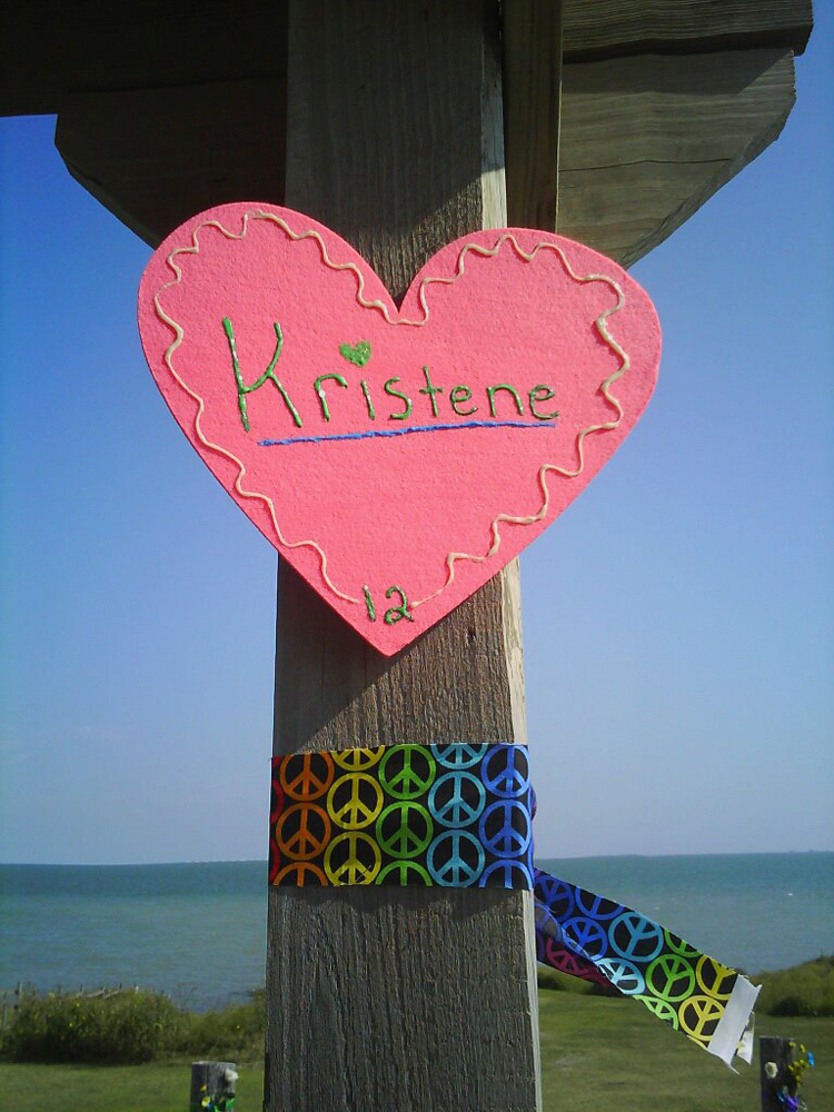 A makeshift memorial was set up near the site in Portland, Tex., where a couple found Mollie Judith Olgin, 19, and Mary Kristene Chapa, 18, after they were shot last week.