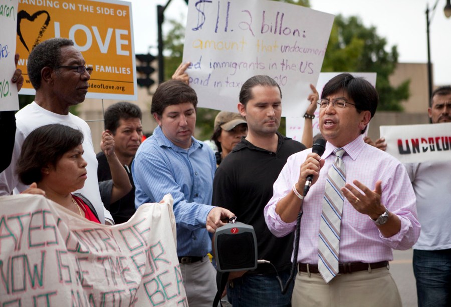 Civil Rights commissioner Michael Yaki addresses a crowd of mostly undocumented immigrants in downtown Birmingham, Ala.