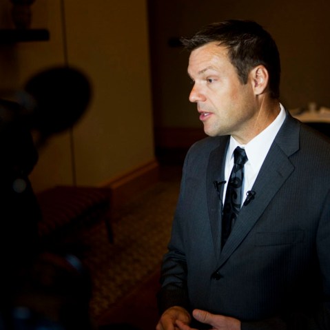 Kris Kobach fields questions from reporters in Birmingham, Ala. on Aug. 17, 2012. (Photo by Bob Miller for NBC News)
