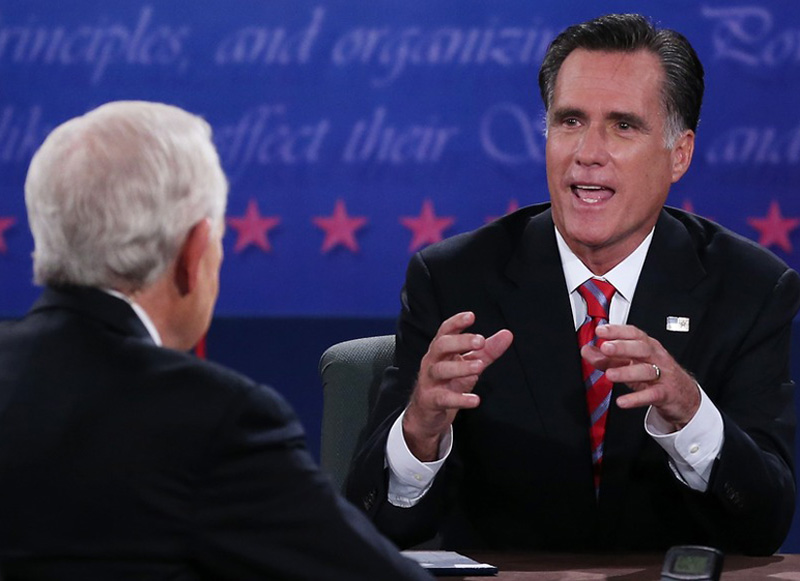 Republican presidential candidate Mitt Romney speaks during the debate as moderator Bob Schieffer listens at Lynn University, Oct. 22, in Boca Raton, Fla. (Photo: Marc Serota/Getty Images)