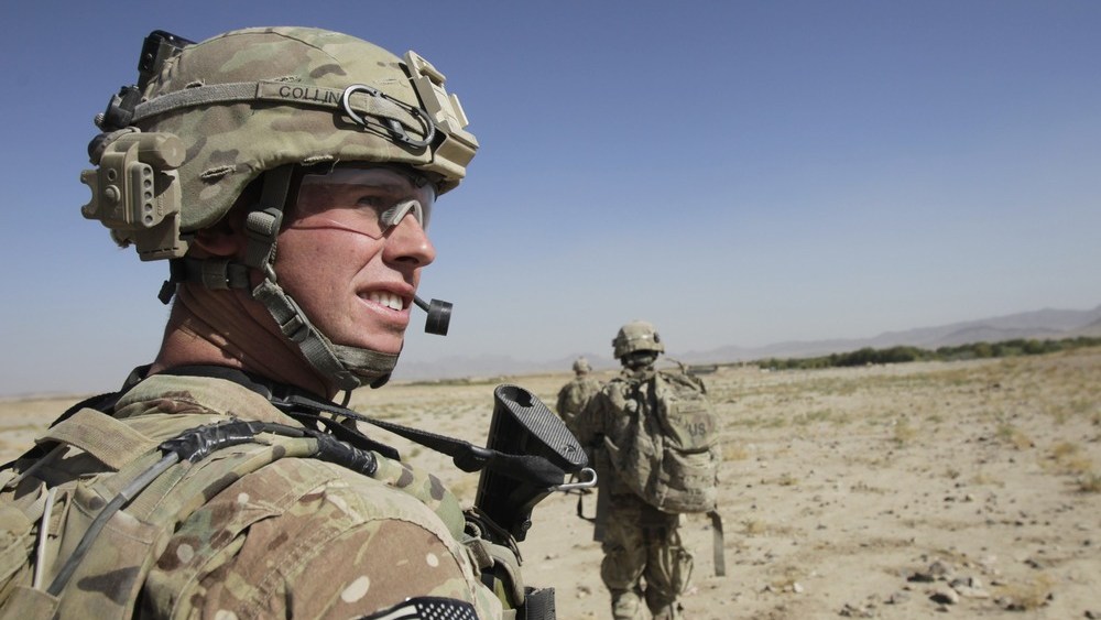 A platoon sergeant of the U.S. Army soldiers of 2nd Battalion, 1st Infantry Regiment, looks at comrades during a joint U.S.-Afghan military patrol in Arghandab Valley in Kandahar province, southern Afghanistan October 22. (Photo: Erik de Castro/Reuters)