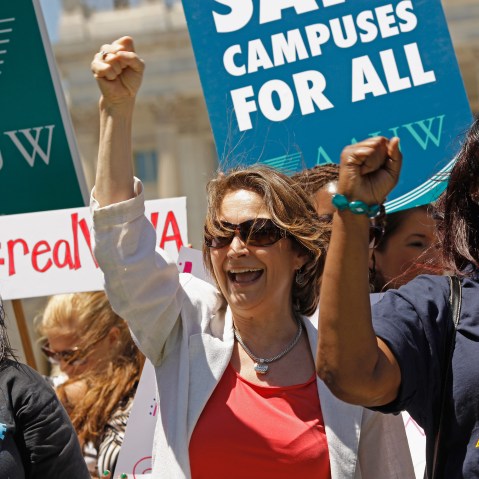 National Organization of Women President Terry O'Neill, center, participates in a rally in support of the Violence Against Women Act on Capitol Hill June 26, 2012 in Washington, DC (Photo by Chip Somodevilla/Getty Images)