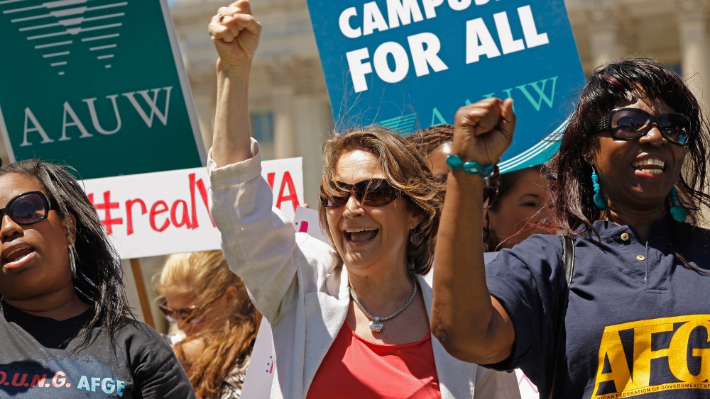 National Organization of Women President Terry O'Neill, center, participates in a rally in support of the Violence Against Women Act on Capitol Hill June 26, 2012 in Washington, DC (Photo by Chip Somodevilla/Getty Images)