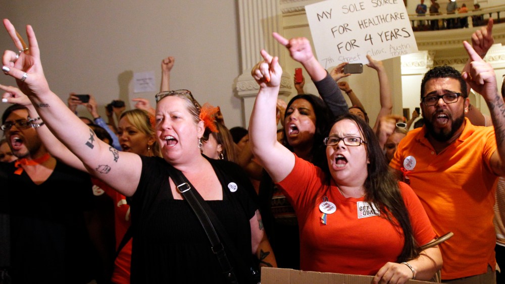 ABORTION RIGHTS ACTIVISTS DEMONSTRATE OUTSIDE THE FLOOR OF THE HOUSE AFTER THE HB2 BILL RESTRICTING ABORTION RIGHTS PASSED IN AUSTIN, TEXAS