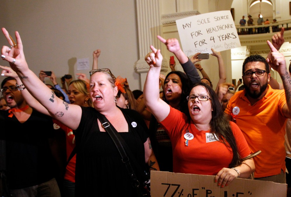 ABORTION RIGHTS ACTIVISTS DEMONSTRATE OUTSIDE THE FLOOR OF THE HOUSE AFTER THE HB2 BILL RESTRICTING ABORTION RIGHTS PASSED IN AUSTIN, TEXAS