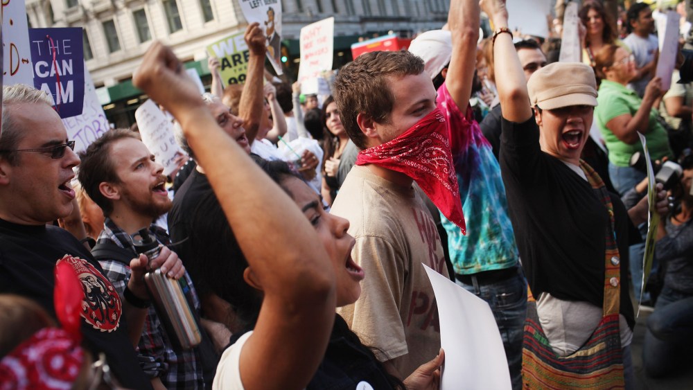 Occupy Wall Street Protestors March Down New York's Fifth Avenue