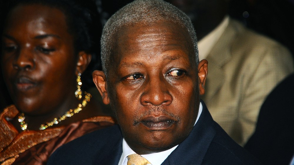 Ugandan Minister Sam Kutesa sits at the anti-corruption court in Kampala, October 13, 2011.