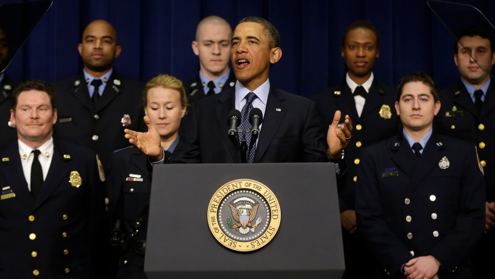 President Barack Obama, accompanied by emergency responders, a group of workers the White House says could be affected by the sequester cuts. (AP Photo/Charles Dharapak)