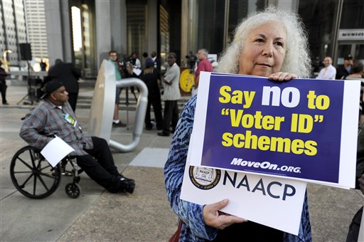 Rhode Island's state GOP may want to say "yes" to voter I.D. for their internal elections. (AP Photo/Michael Perez)