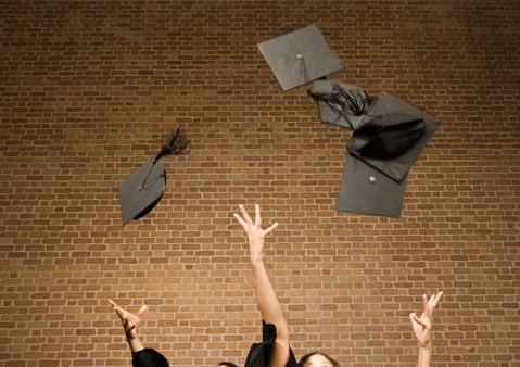 Graduates throwing their mortar boards, school, graduation, celebration