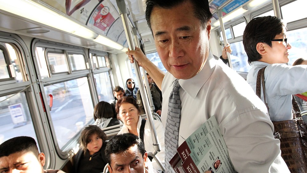 File Photo: California State senator and then candidate for San Francisco mayor Leland Yee campaigns on a MUNI bus on November 7, 2011 in San Francisco, California. (Photo by Justin Sullivan/Getty Images, File)