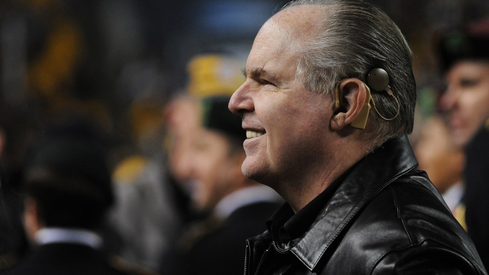Rush Limbaugh looks on from the sideline before a Baltimore Ravens game, Nov. 6, 2011.