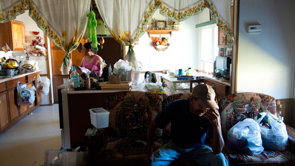 Praxedis Teran, left and Angel Coronilla, in their mobile home in Foley, Ala. on Oct. 7, 2011, shortly after Alabama passed one of the strictest immigration laws in the country.
