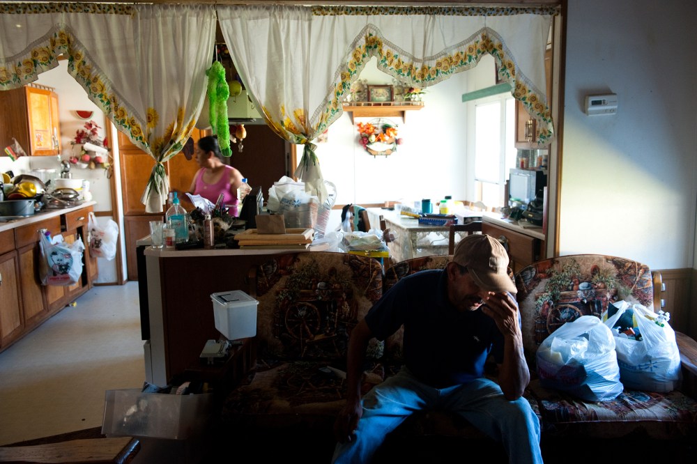 Praxedis Teran, left and Angel Coronilla, in their mobile home in Foley, Ala. on Oct. 7, 2011, shortly after Alabama passed one of the strictest immigration laws in the country.