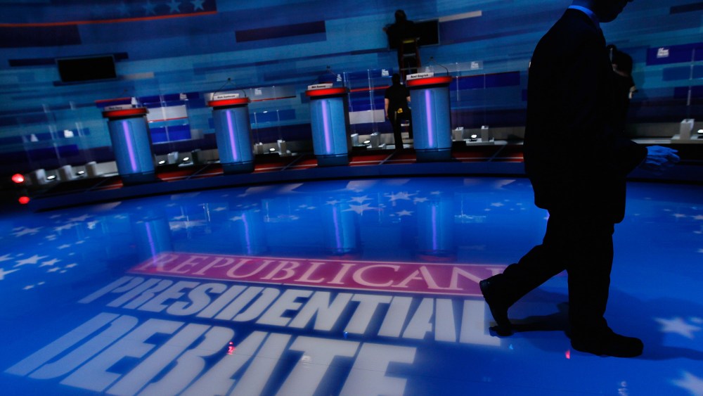 Workers prepare the stage for the Fox News/Wall Street Journal/South Carolina GOP debate at the Sheraton Myrtle Beach Convention Center on Jan. 16, 2012 in Myrtle Beach, S.C. (Photo by Joe Raedle/Getty)