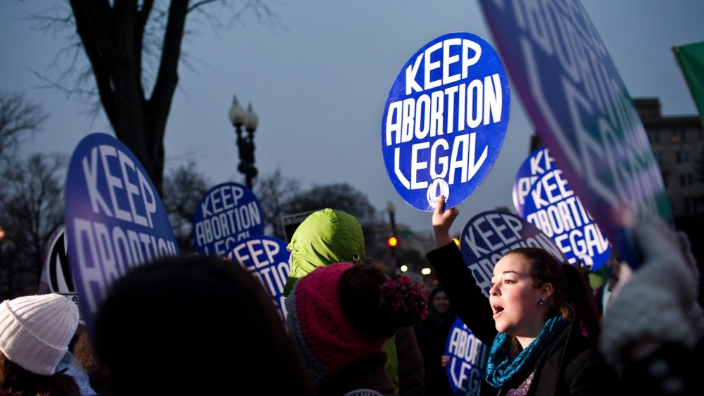Pro-choice activists hold a vigil outside the U.S. Supreme Court on Jan. 23, 2012 in Washington, DC.