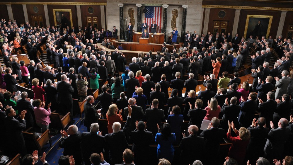 File Photo: US President Barack Obama receives applause as he delivers his State of the Union address before a joint session of Congress January 24, 2012 on Capitol Hill in Washington, DC. (Photo by Mandel Ngan/AFP/Getty Images/File)