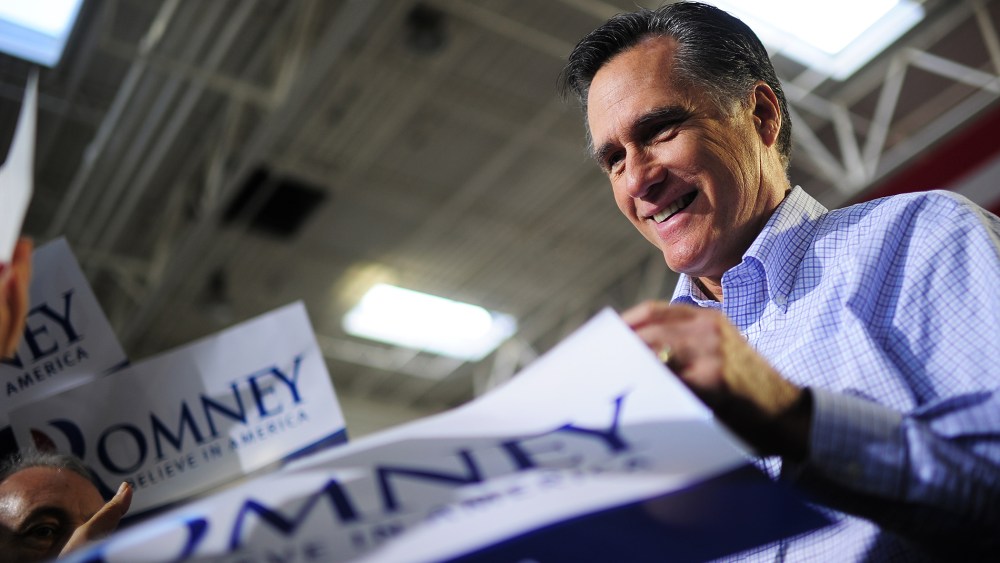 Former Republican presidential nominee Mitt Romney greets supporters as he holds a campaign rally  in Jacksonville, Fla., on Jan. 30, 2012.
