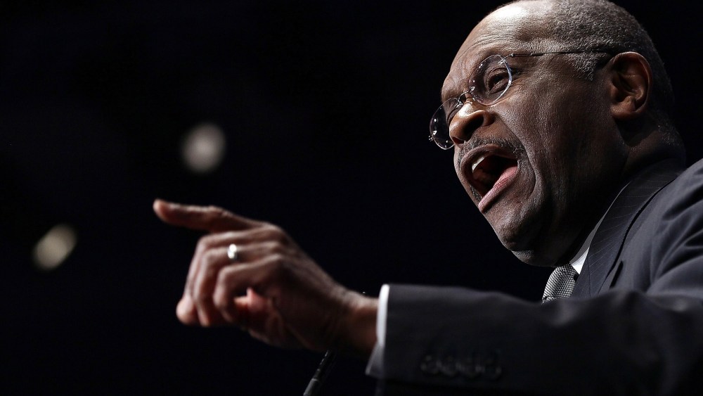 Herman Cain addresses the annual Conservative Political Action Conference (CPAC) February 9, 2012 in Washington, D.C. (Photo by Win McNamee/Getty)