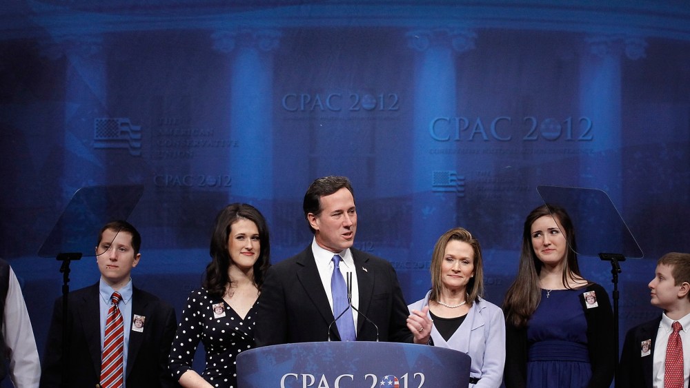 File Photo: Republican presidential candidate and former U.S. Senator Rick Santorum (4L) is joined on stage by his family as he delivers remarks to the Conservative Political Action Conference (CPAC) at the Marriott Wardman Park February 10, 2012 in...