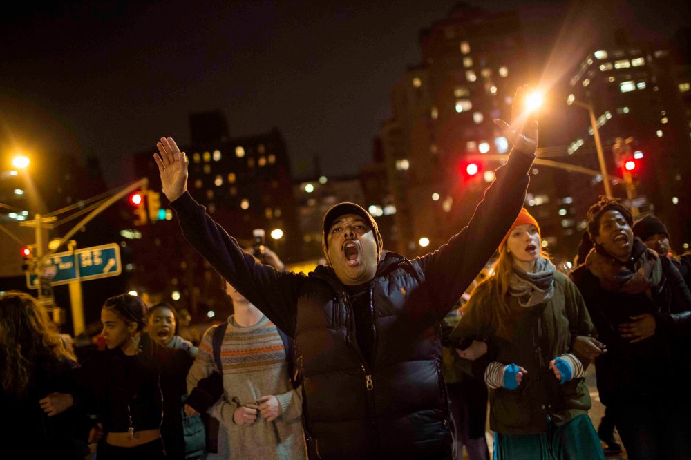 Protesters shout slogans during a demonstration demanding justice for the death of Eric Garner in Manhattan, New York City, on Dec. 5, 2014.