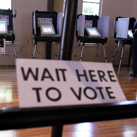 A local resident casts her vote at a polling station in St Andrew Presbyterian Church March 6, 2012 in Sandy Springs, Georgia.