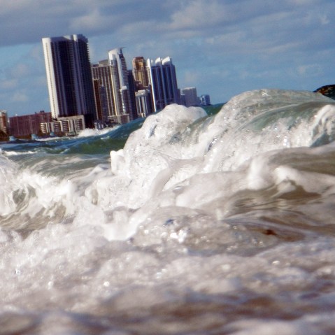Buildings are seen near the ocean as reports indicate that Miami-Dade County could be one of the most susceptible places when it comes to rising water levels due to global warming, on March 14, 2012 in North Miami, Florida. (Photo by Joe Raedle/Getty)